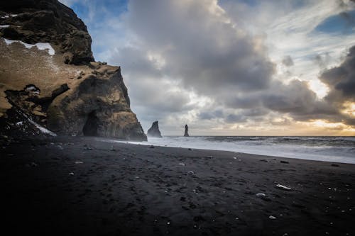 bezplatná Základová fotografie zdarma na téma černá písečná pláž, černý písek, island Základová fotografie