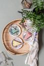 Brown and White Ceramic Plates on Brown Woven Round Table