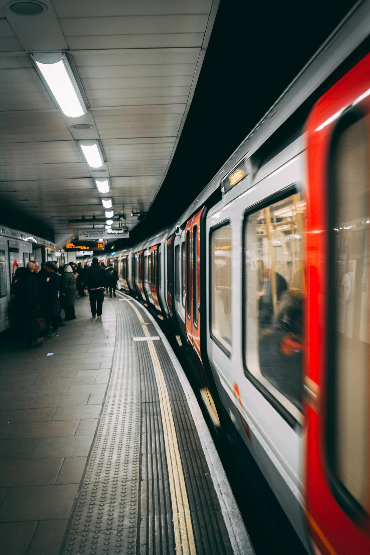 People Standing Beside Train