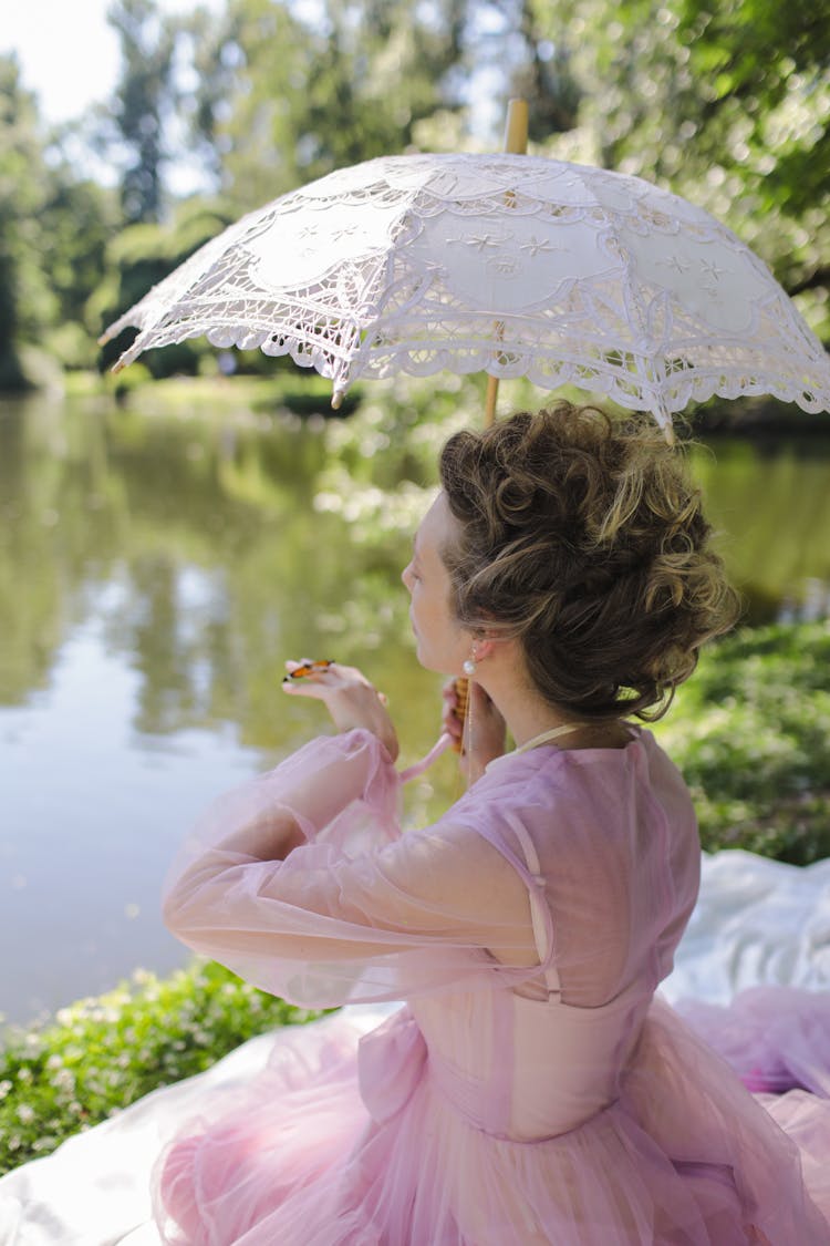 Women In Lace Dress Holding An Umbrella