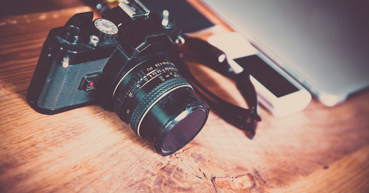 DSLR camera on a wooden table