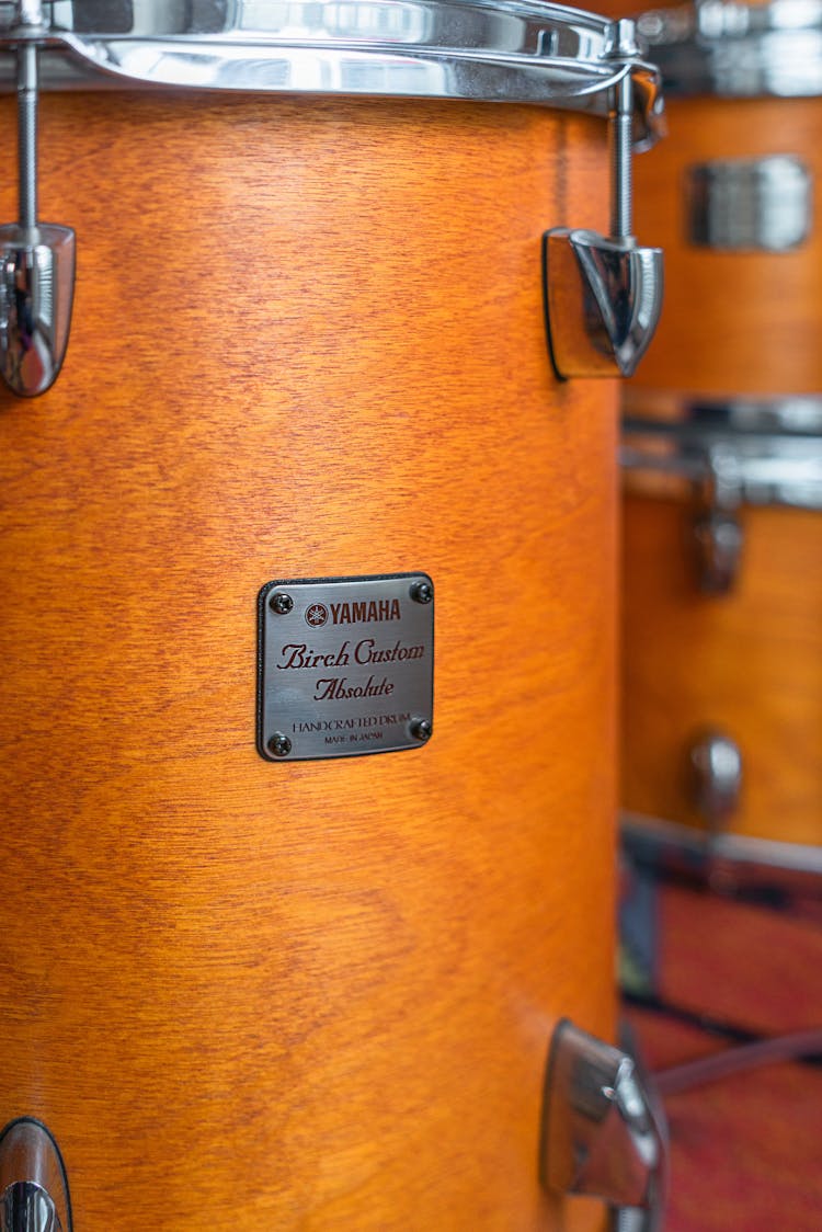 Logo Plaque On A Drum Set 