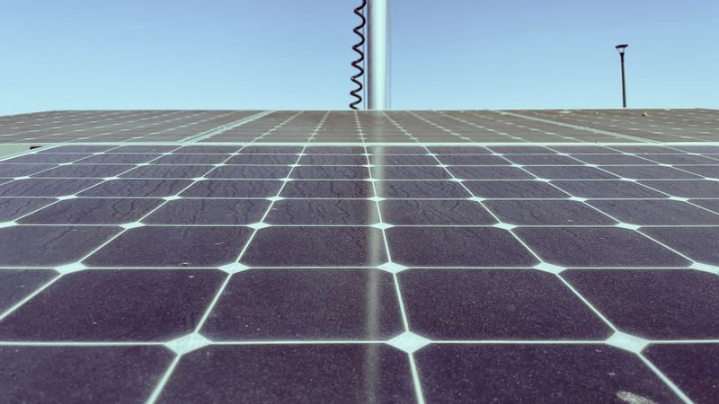 Detailed view of solar panels capturing sunlight, showcasing renewable energy technology.