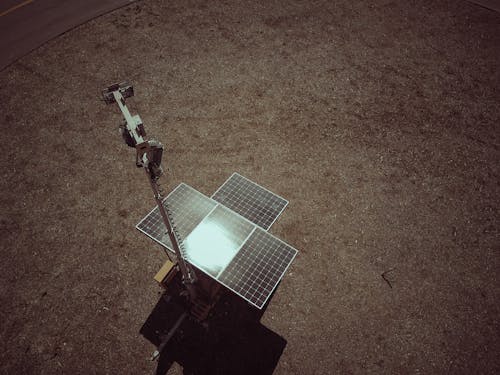 Drone Shot of Solar Panels on Grass