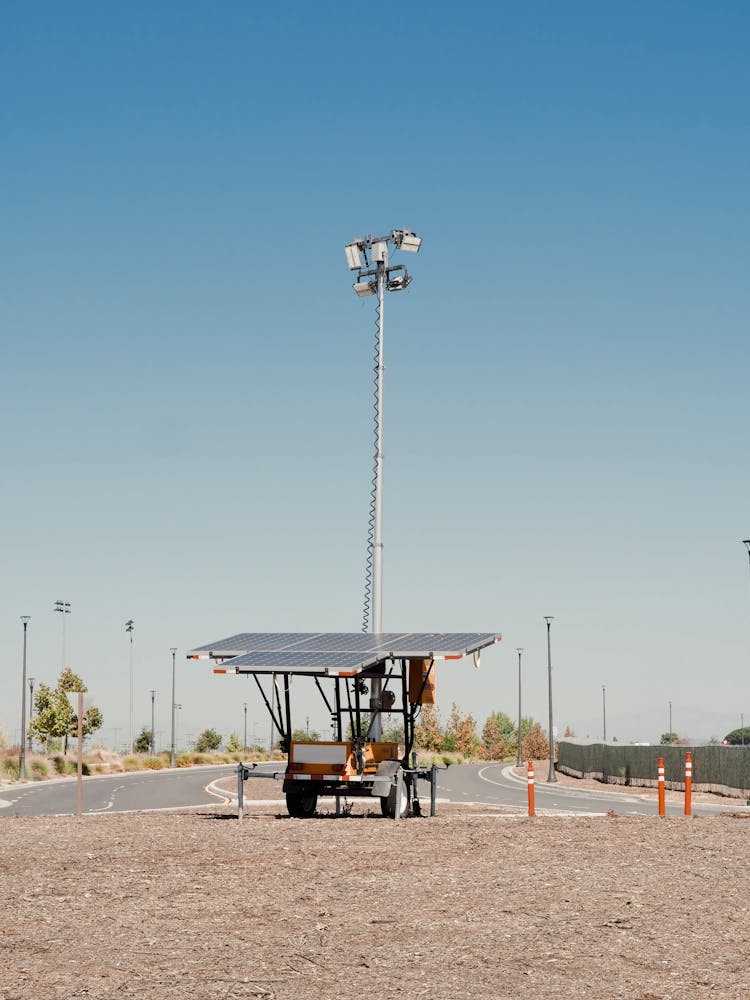 Solar Panels Near A Concrete Road