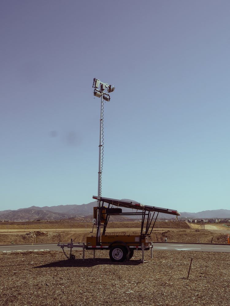 Portable Power Station On Brown Field 