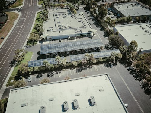Aerial Photography of Solar Panels and Buildings