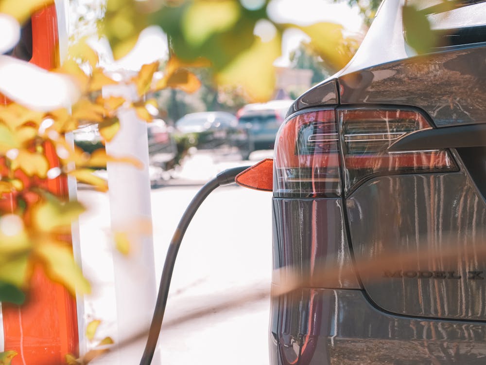 Free Close-Up Shot of an Electirc Car Charging Stock Photo