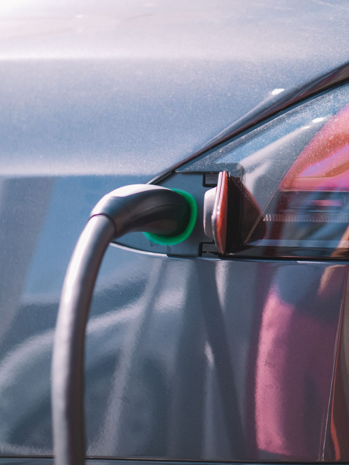 EV charging infrastructure in the US 2026 — public DC fast charging station on highway