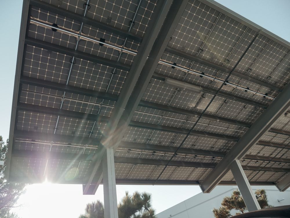 Solar panels on a metal mounting structure in sunlight
