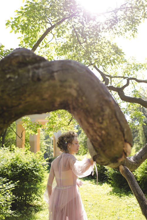 Woman Wearing Long Sleeves Standing Near Tree