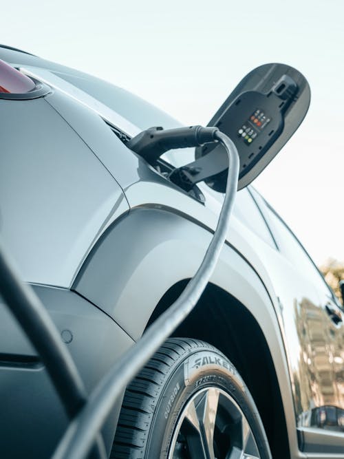 Free An Electric Car Charging Stock Photo