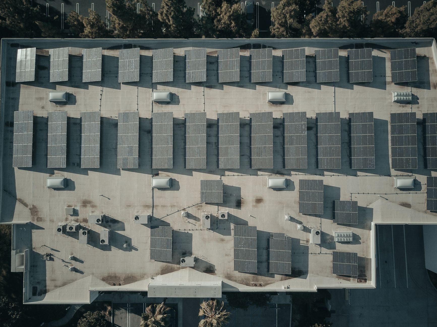 Aerial view of school rooftop with solar panels