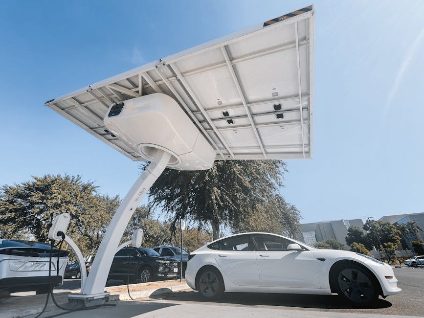 Image of a solar panel and an electric car representing industrial demand - silver maple leaf spot price Image of a solar panel and an electric car representing industrial demand - silver maple leaf spot price