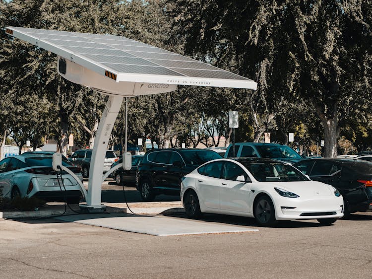 Electric Cars Charging On Stations