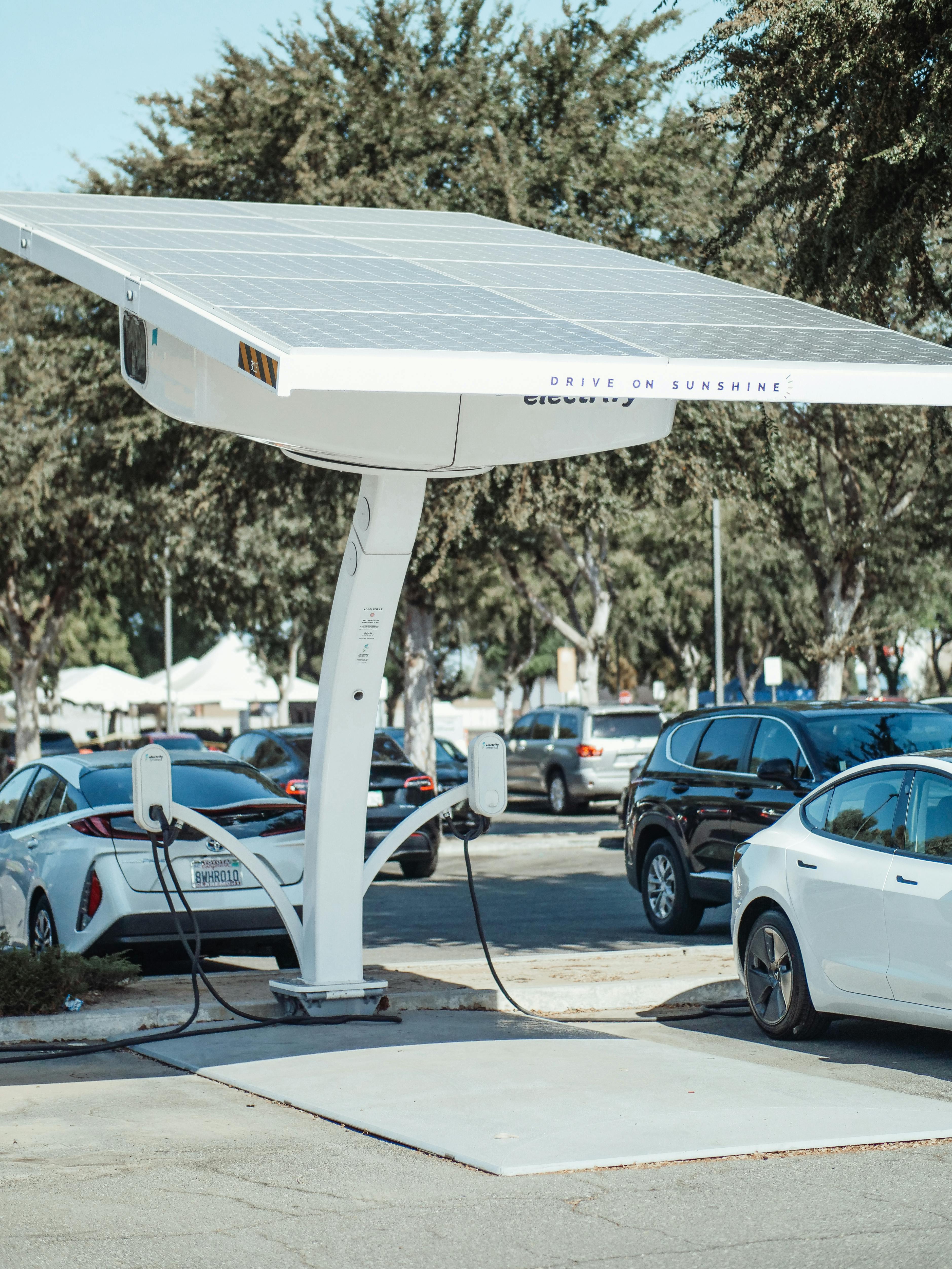 Image Name Solar panels and electric vehicle charging station