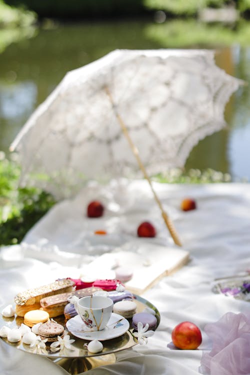 Desserts and Porcelain Cup on Cake Stand