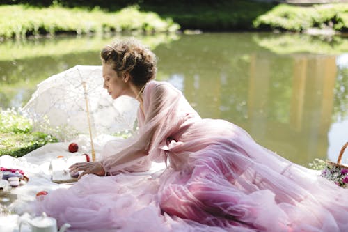 Elegant Woman in Pink Sheer Dress