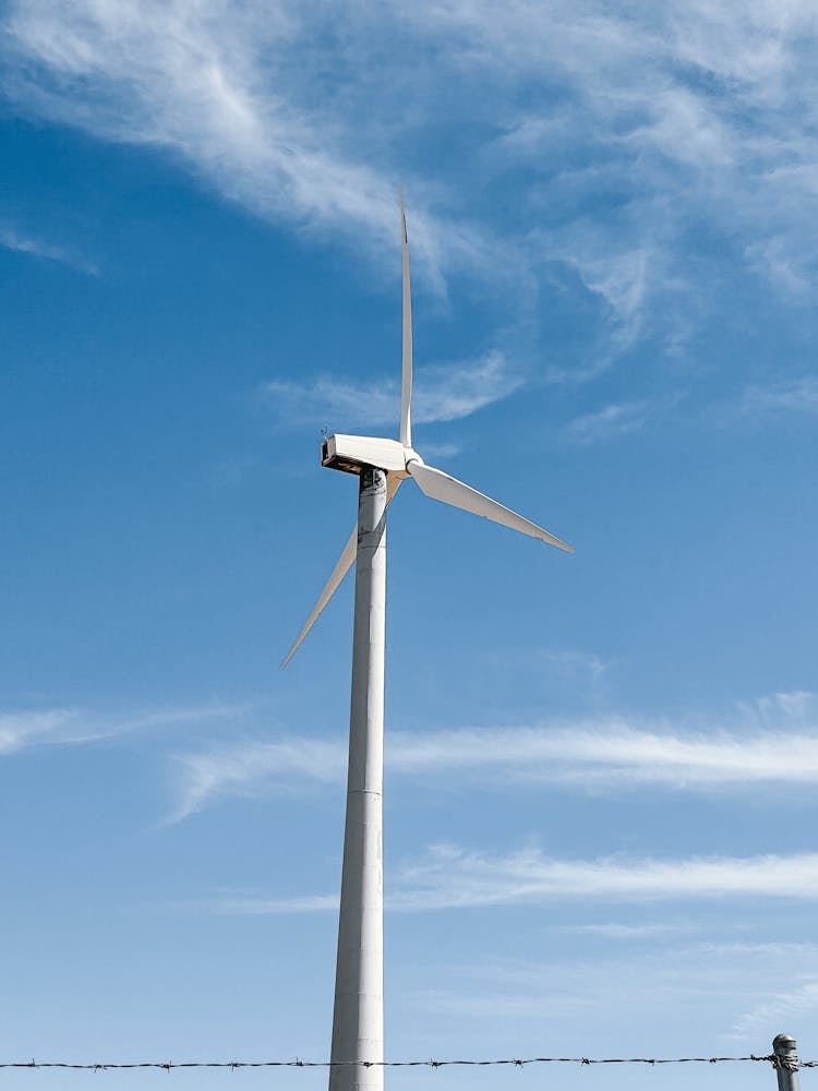 Wind Turbine Under The Beautiful Sky