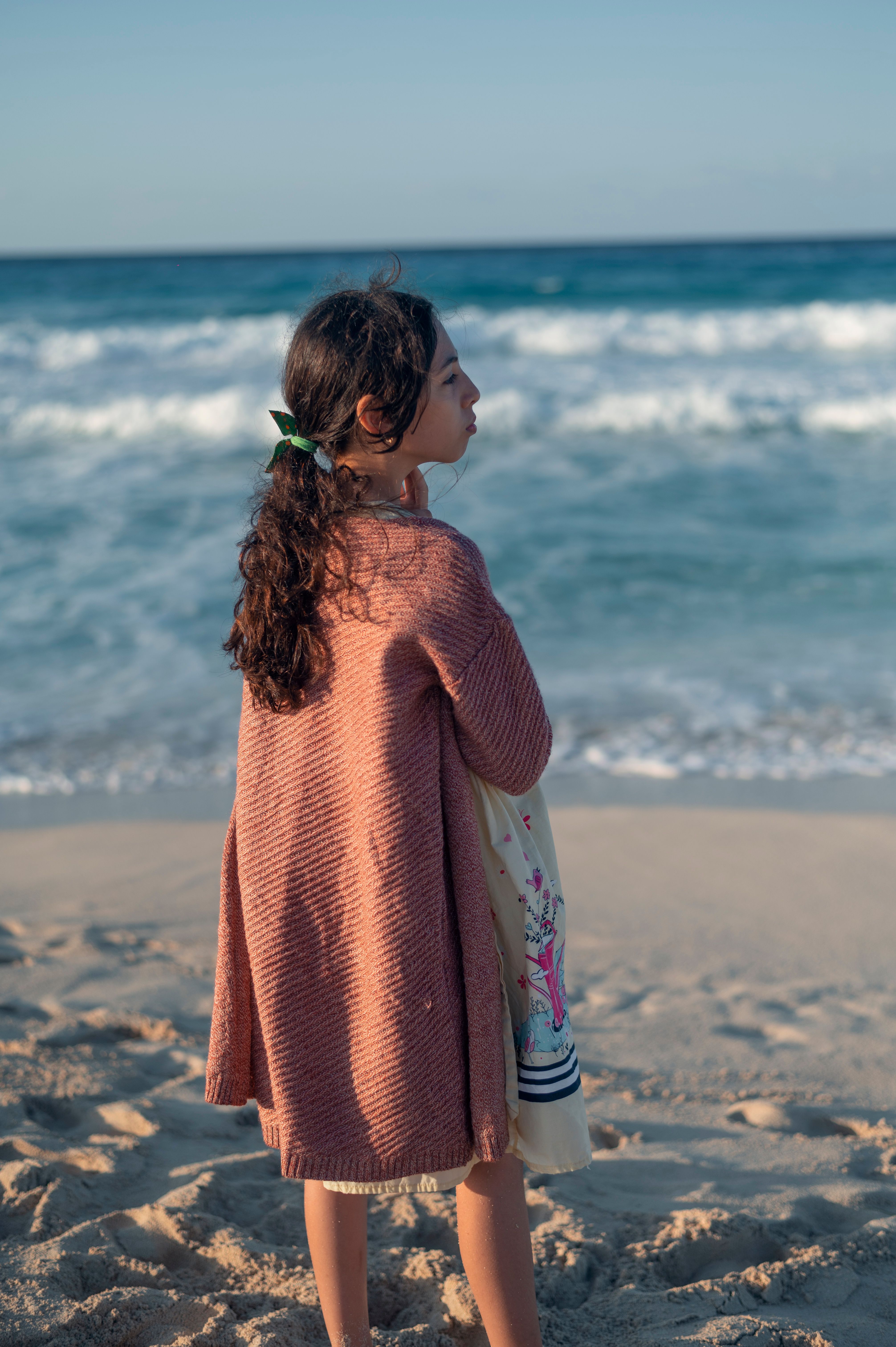 A Girl Standing Beside the Beach · Free Stock Photo