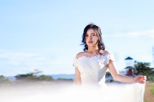 Woman In White Off-shoulder Gown