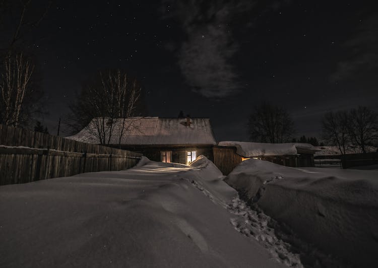 Pile Of Snow Outside A House