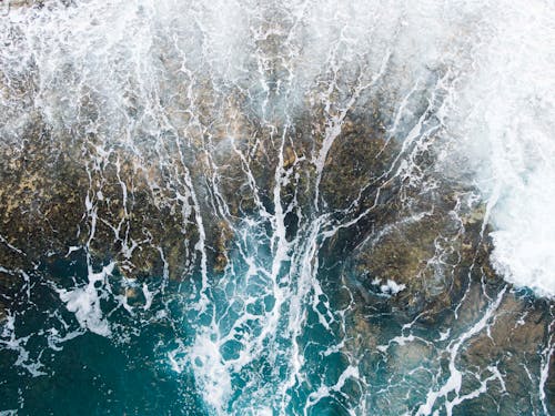 Top View of Sea Waves Crashing on Shore