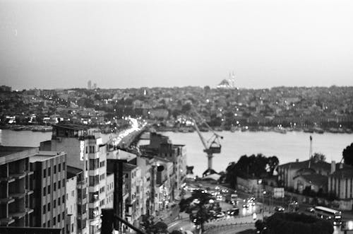 Grayscale Photo of City Buildings