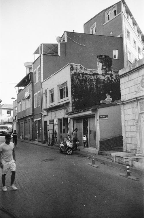Monochrome Photograph of People in the Street