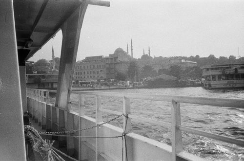 Free Grayscale cityscape of Istanbul with ferry and iconic minarets in view. Stock Photo