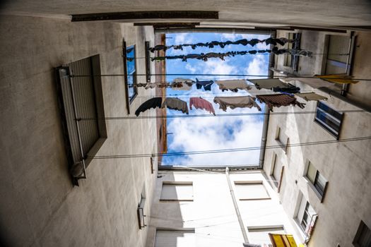 Assorted Clothes Hanging on Wire
