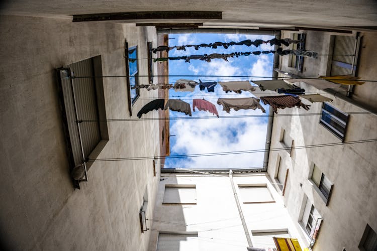 Assorted Clothes Hanging On Wire