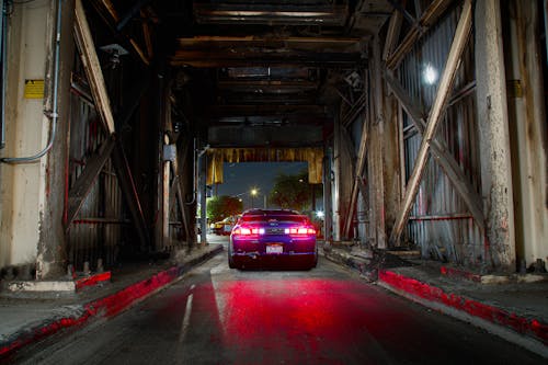 Blue Nissan 240SX in Old Warehouse