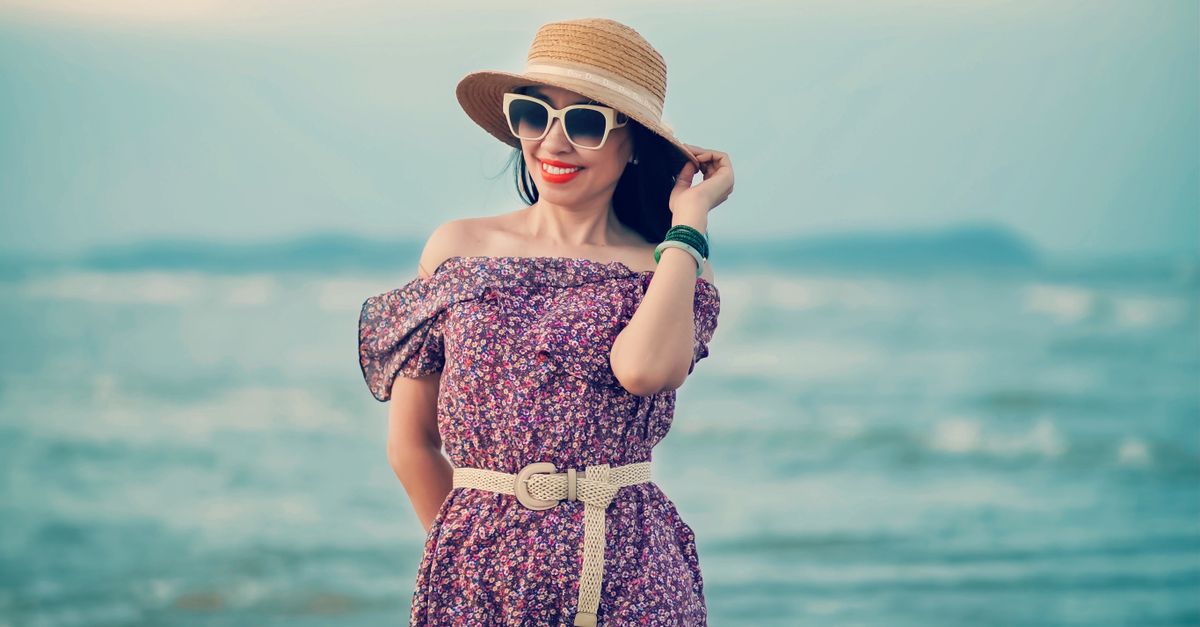 Woman in Floral Dress Posing at the Beach Free Stock Photo Woman in Floral Dress Posing at the Beach Free Stock Photo