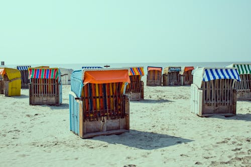 Free stock photo of beach, sand, shacks