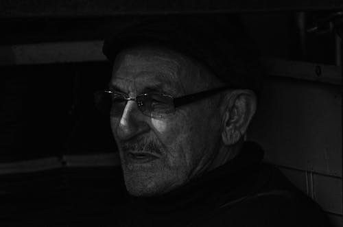 Free Black and White Photo of an Elderly Man Wearing Eyeglasses Stock Photo
