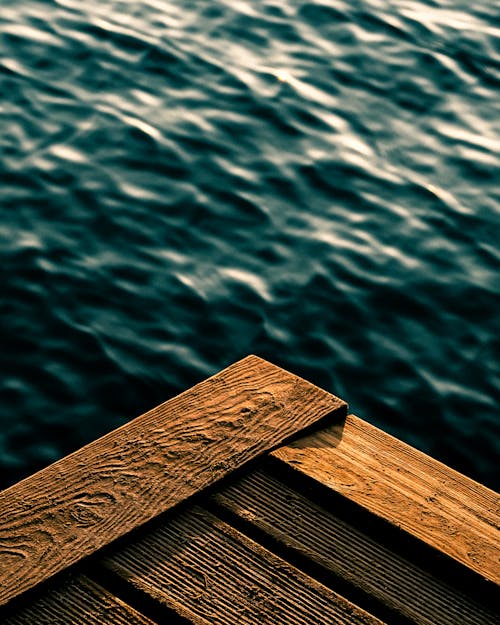 Wooden Plank near a Body of Water