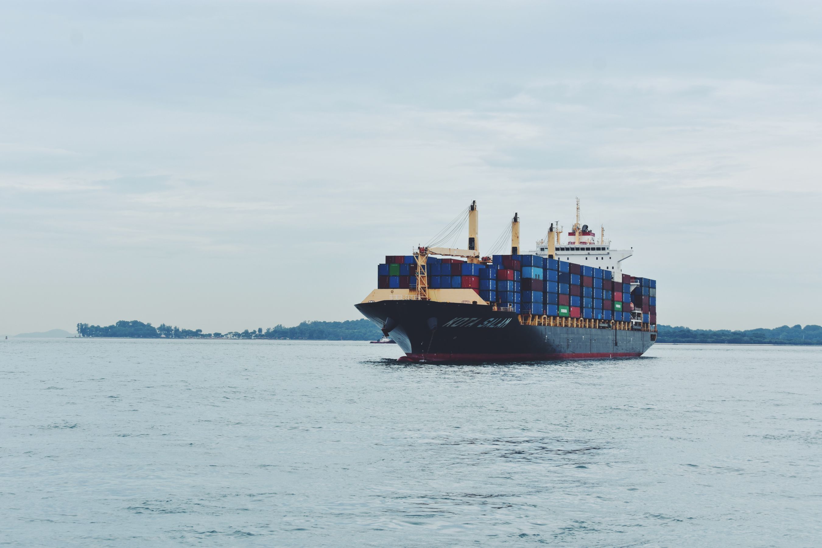 Container ship loading at port