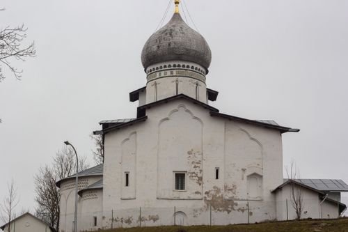Free A low-angle view of an ancient Orthodox church under a grey, gloomy sky. Stock Photo