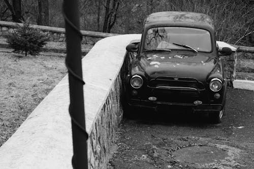 Grayscale Photo of an Old Car