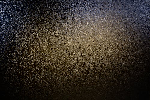 Free Close-Up Shot of Raindrops on a Glass Window Stock Photo