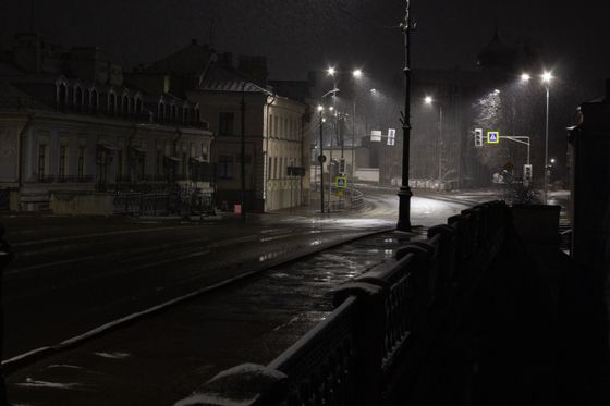 Wet city street at night, photo by Plato Terentev on Pexels