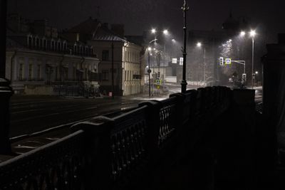 Dark rain-slicked street — Plato Terentev on Pexels