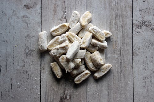 Gnocchi on Gray Wooden Surface