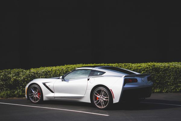 Silver sports coupe, side view — photo by Snapwire on Pexels