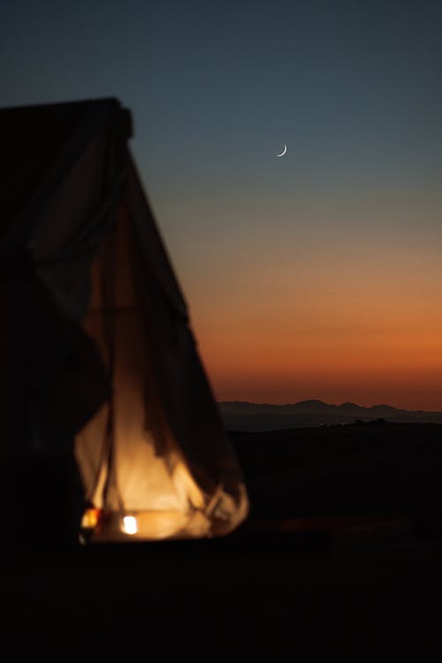 Dark silhouette of camping tent