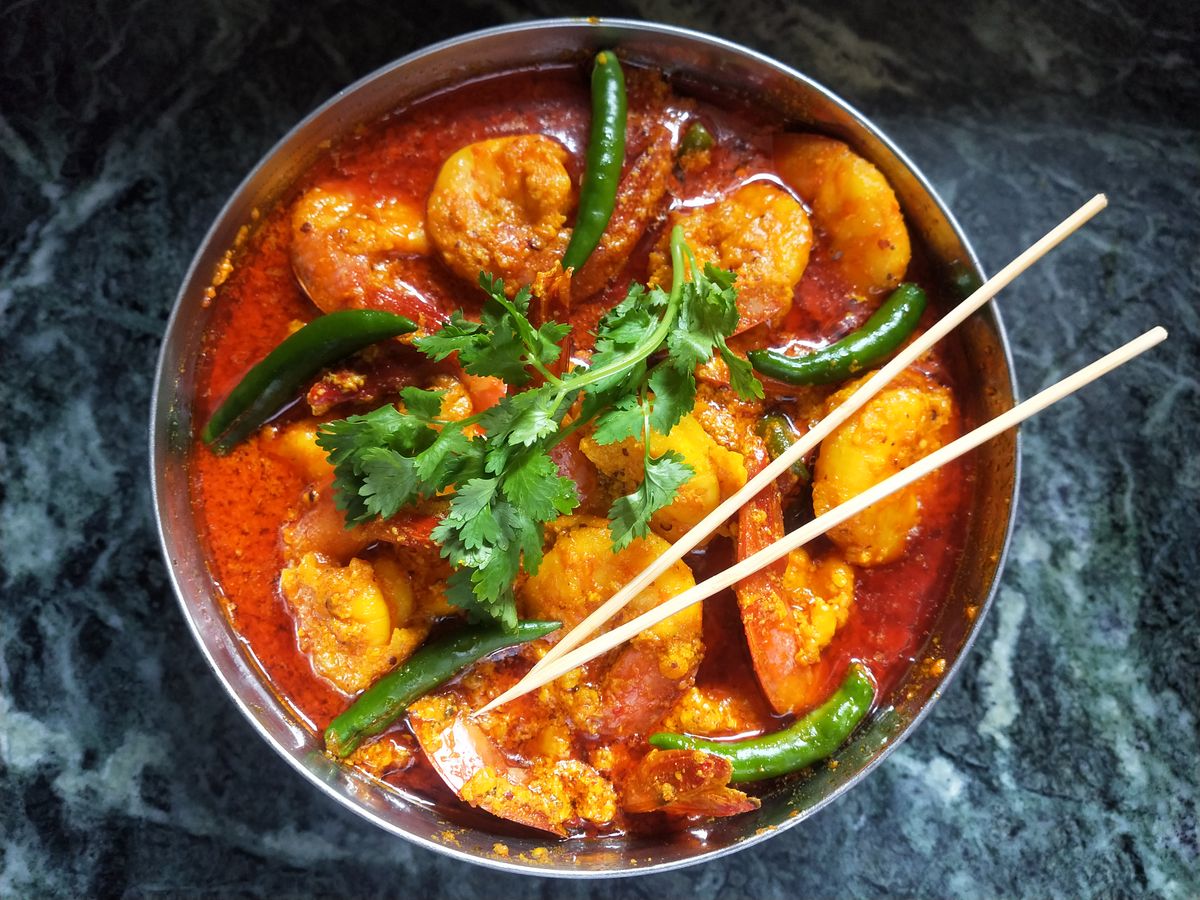 Prawn curry in a steel bowl