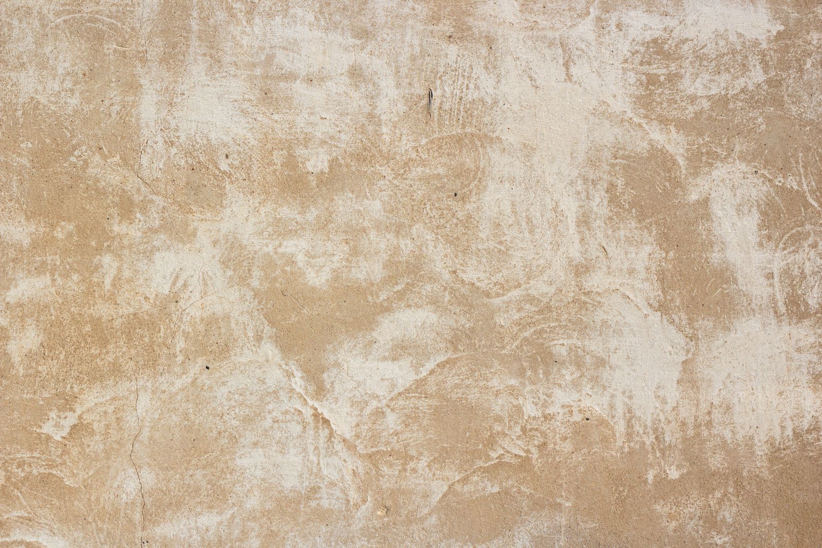 Warm plaster wall texture — photo by Plato Terentev on Pexels