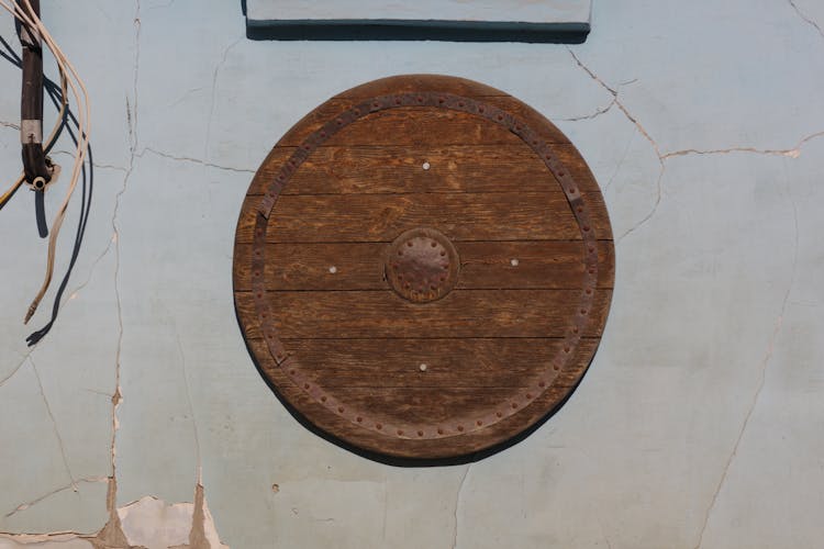 Wooden Shield On A Wall