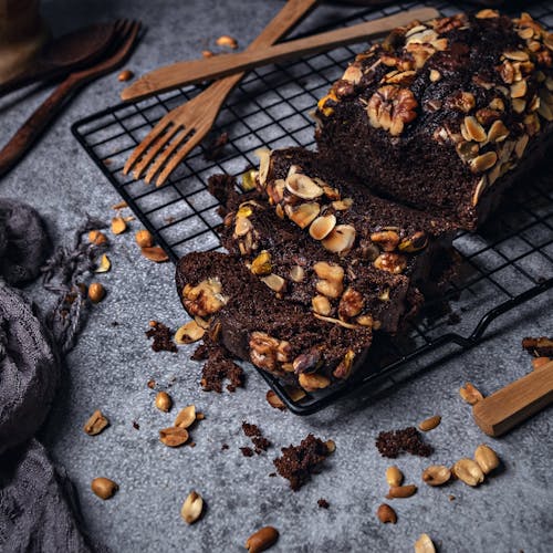 Free Chocolate Cake with Nuts on a Cooling Rack Stock Photo